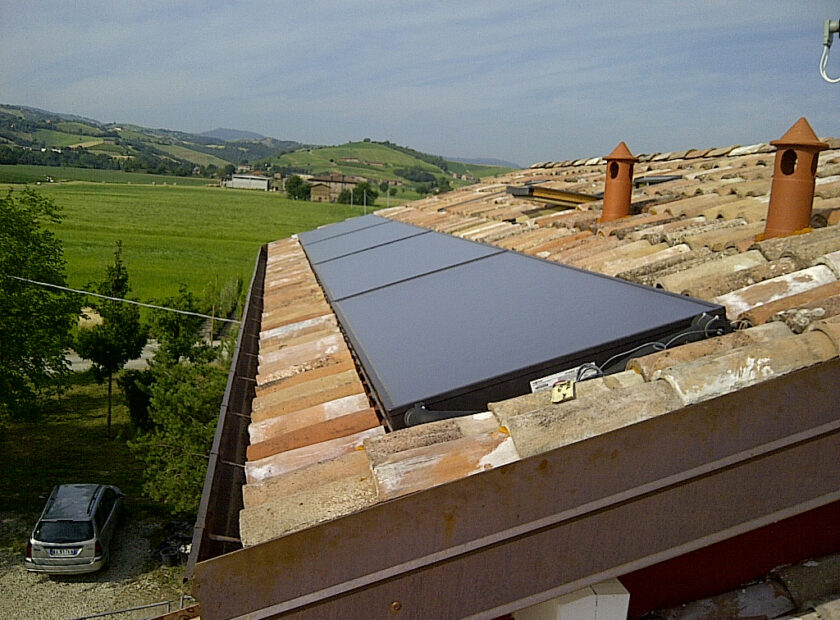 VILLA CON RISCALDAMENTO E PRODUZIONE DI ACS CON CALDAIA A LEGNA E SOLARE TERMICO